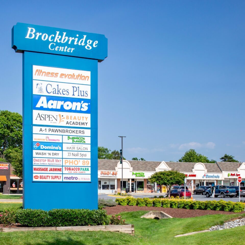 Brockbridge Center shopping plaza sign with multiple store names